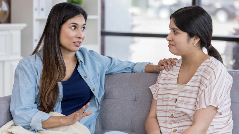 woman talking to another woman about divorce