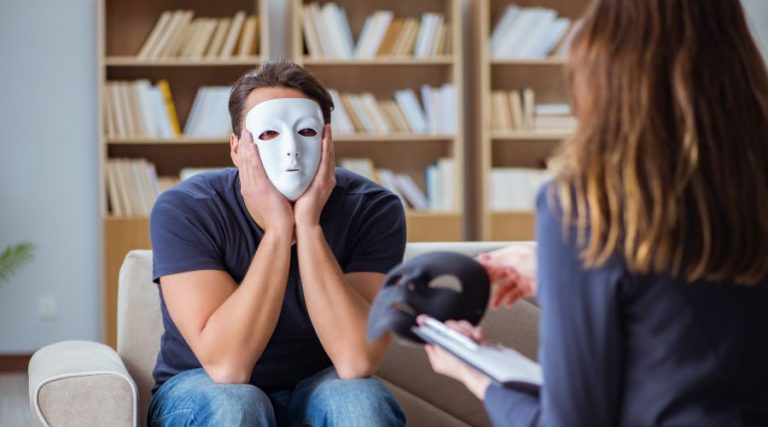 woman talking to husband wearing a mask symbolizing narcissism